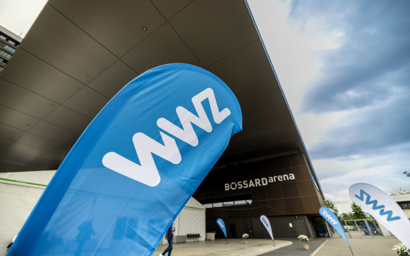 General meeting of WWZ AG in the Arena Flags in front of the tent and Bossard Arena for the AGM.